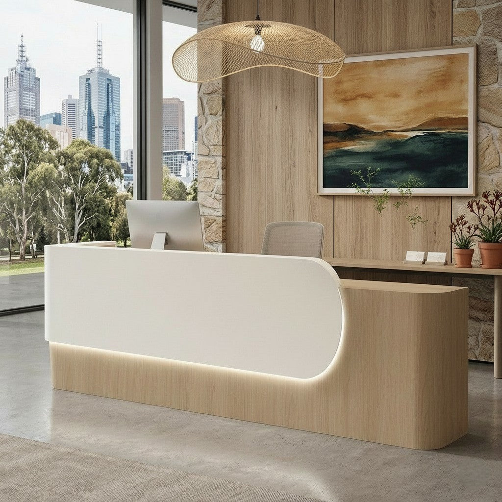 Elegant Reception Counter with Curved White Marble Front and Integrated Lighting for Entryways
