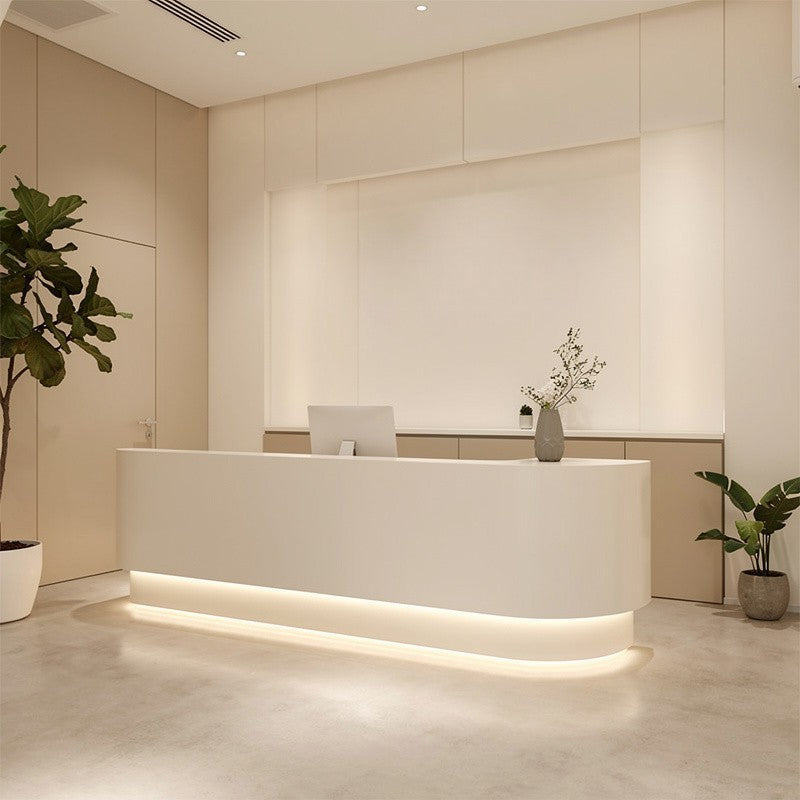 Minimalist Curved Reception Counter with Ambient LED Illumination for Professional Studios and Clinics
