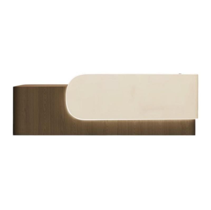 Elegant Reception Counter with Curved White Marble Front and Integrated Lighting for Entryways