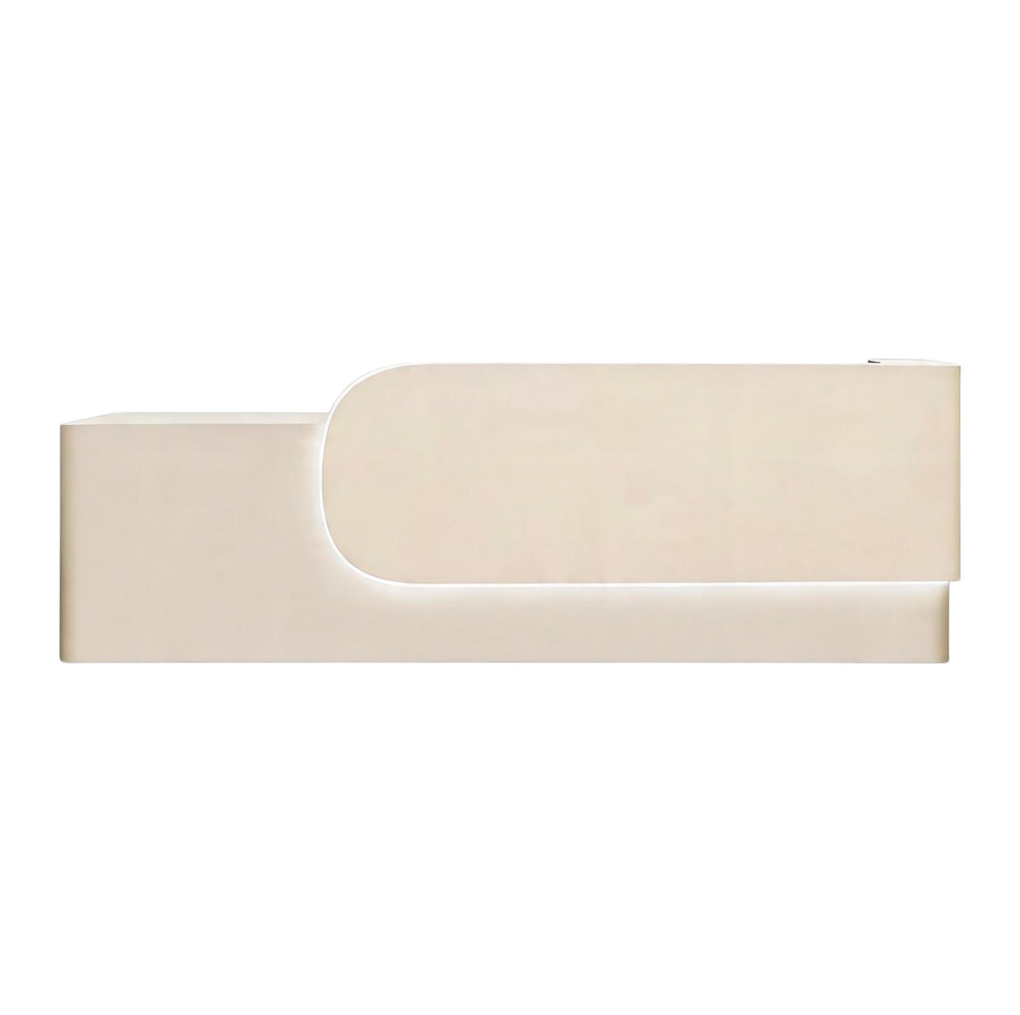 Elegant Reception Counter with Curved White Marble Front and Integrated Lighting for Entryways