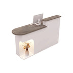 Modern Reception Desk with Soft-Lit Display Alcove