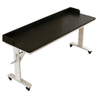 Black mobile height adjustable office table with raised edge and flexible layout