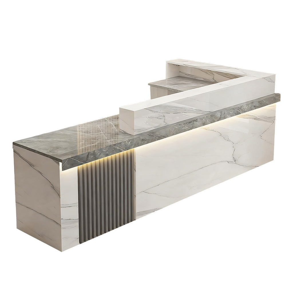 Left high return grey white marble look reception desk with fluted detail for commercial reception spaces