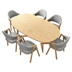 Hospitality dining table with natural wood finish and grey upholstered chairs