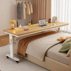 Mobile height adjustable desk in a modern home office workspace with wooden desktop