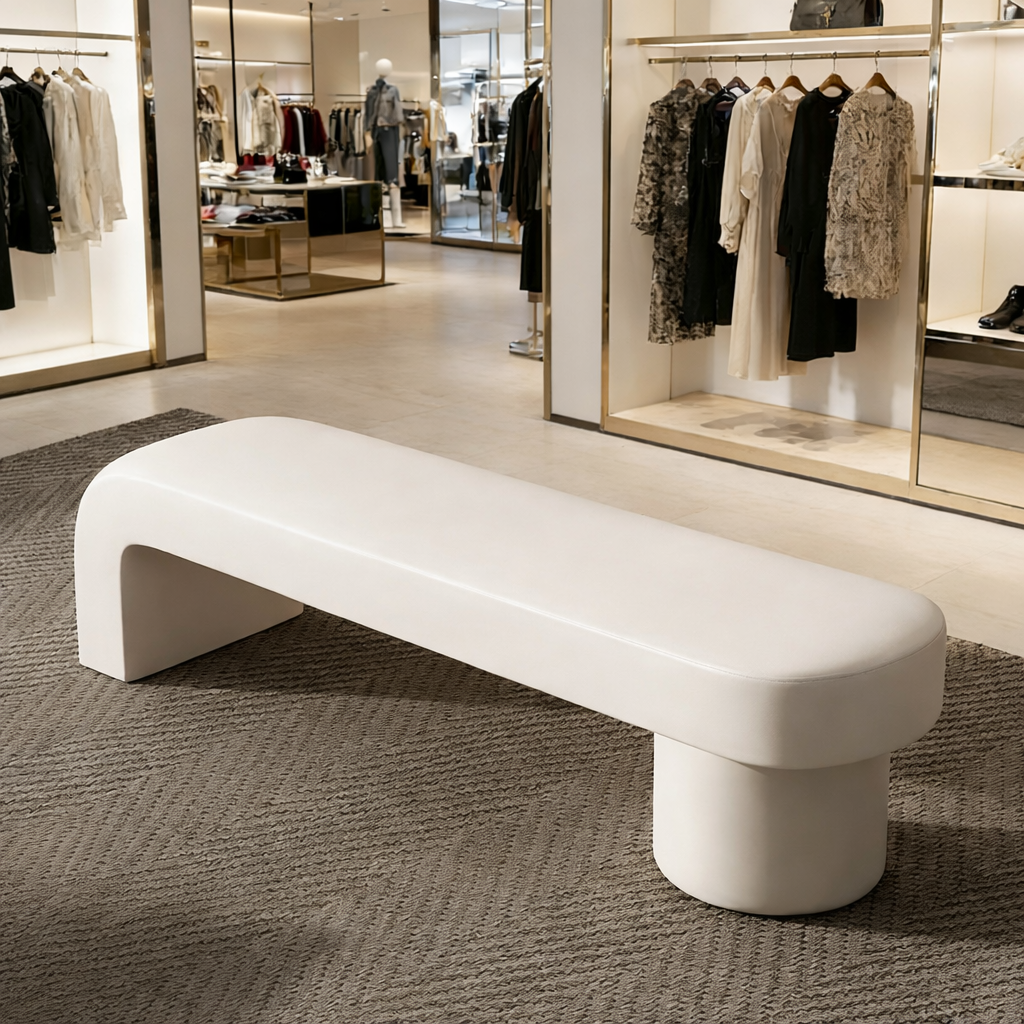 Modern upholstered lounge bench seat with rounded design for retail and commercial spaces