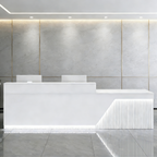 Modern white reception counter with LED lighting for commercial office spaces