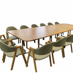 Natural Wwood dining table set with green upholstered chairs for modern dining areas, cafés and hotel interiors