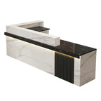 Right high return grey white marble look reception desk with fluted detail for commercial reception spaces