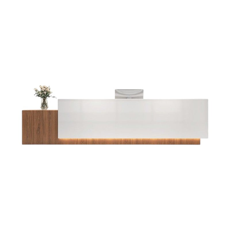 White reception desk with LED strip lighting and contemporary office design
